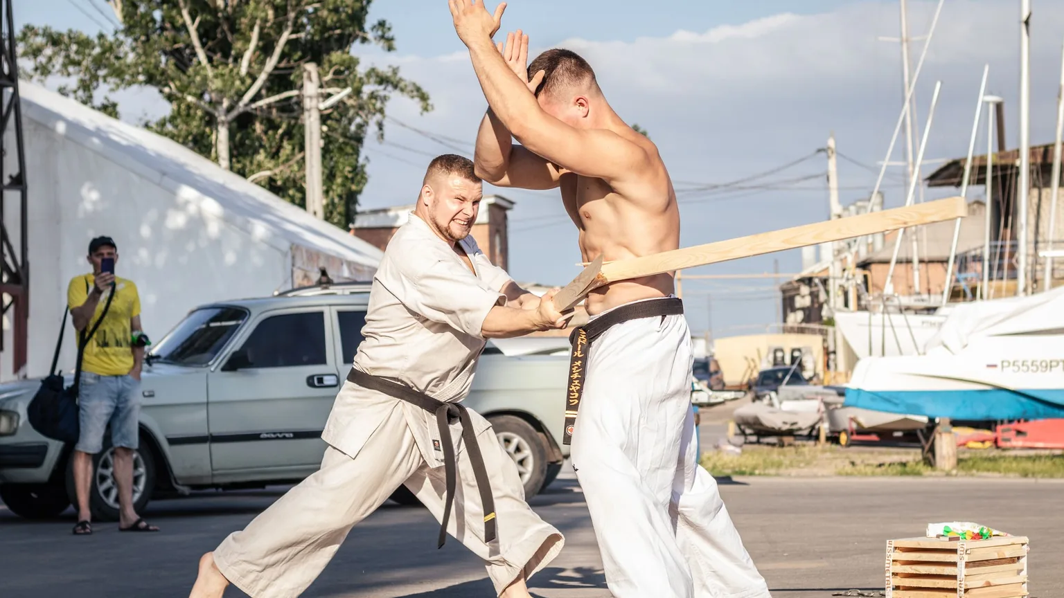 Two martial artists giving a demonstration outdoors